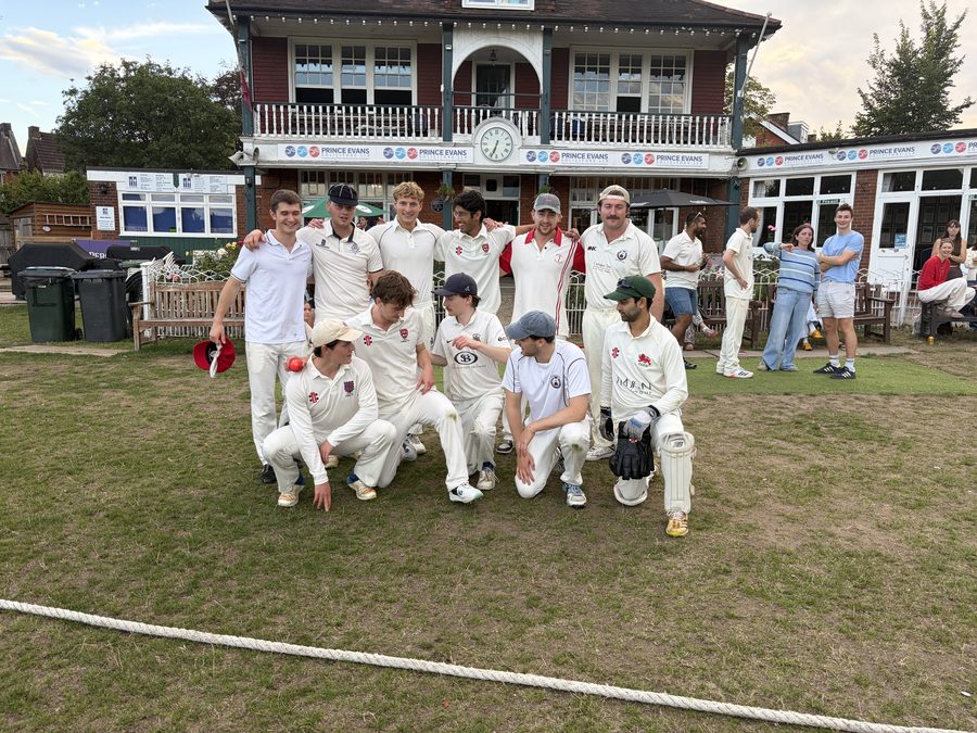 Team group photo in front of the pavilion